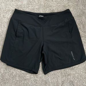 Brooks lined running shorts with pockets. Size L